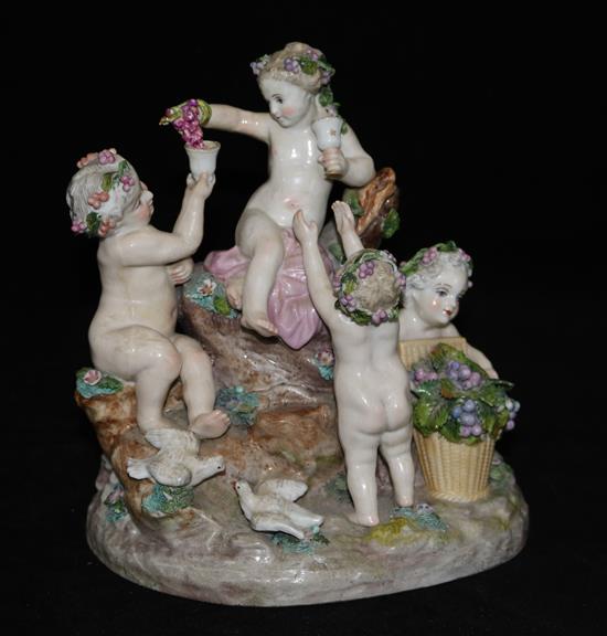 A German porcelain group of Bacchanalian cherubs